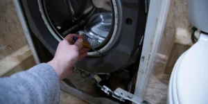 how to repair leaking washing machine